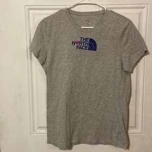 The North Face t-shirt women’s large cotton and polyester with pink heart.